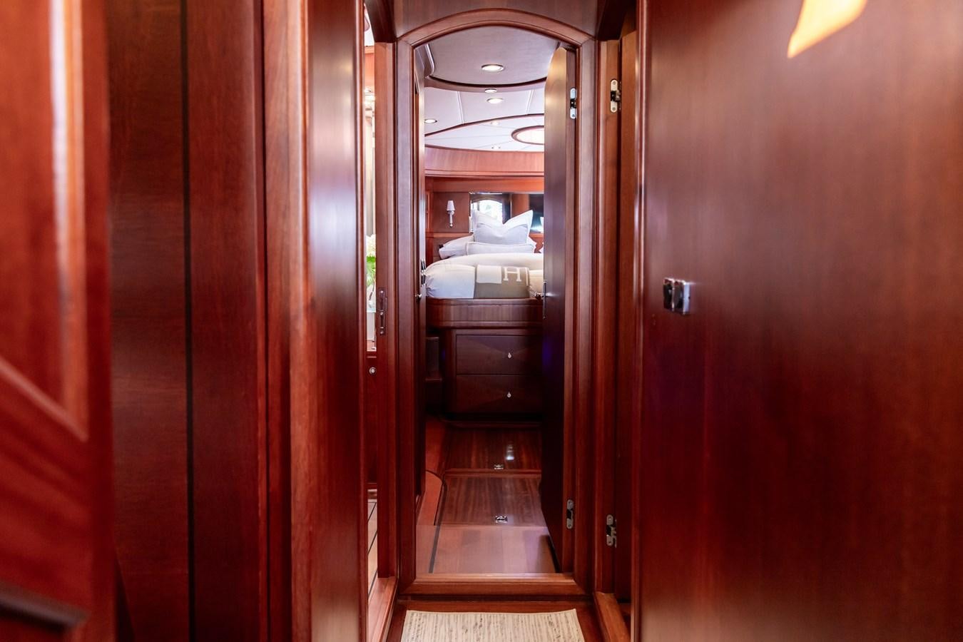 a hallway with a couple of doors aboard ARAGOSTA Yacht for Sale