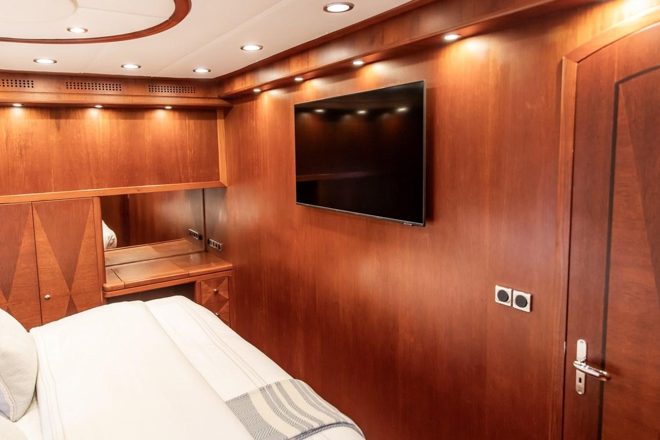 a room with wooden cabinets aboard ARAGOSTA Yacht for Sale
