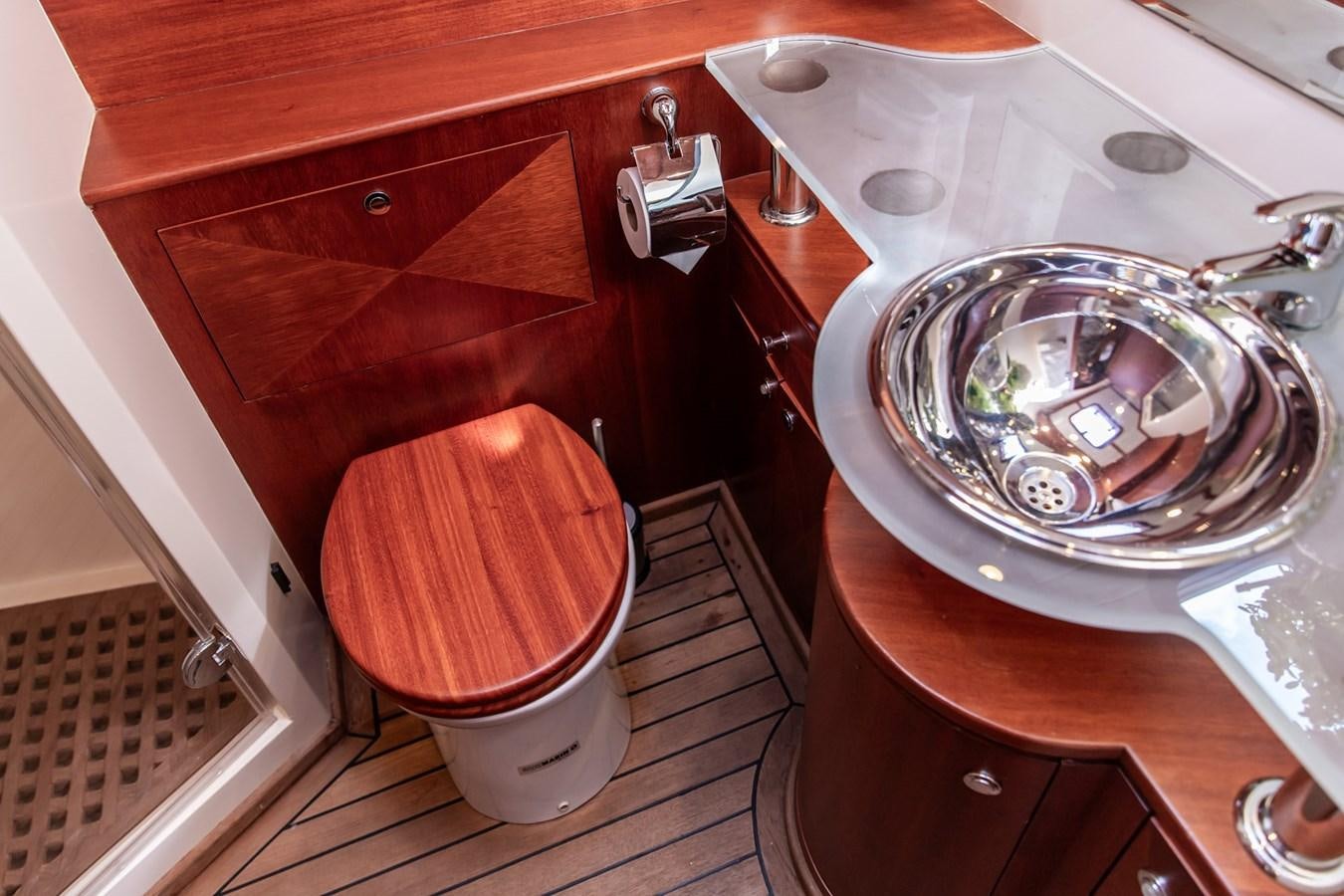 a sink and toilet in a bathroom aboard ARAGOSTA Yacht for Sale
