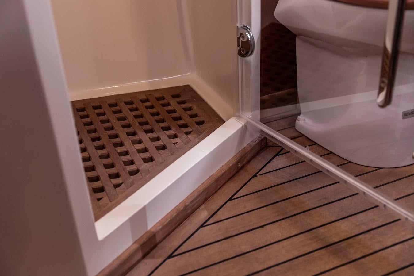 a white machine with a metal bar aboard ARAGOSTA Yacht for Sale