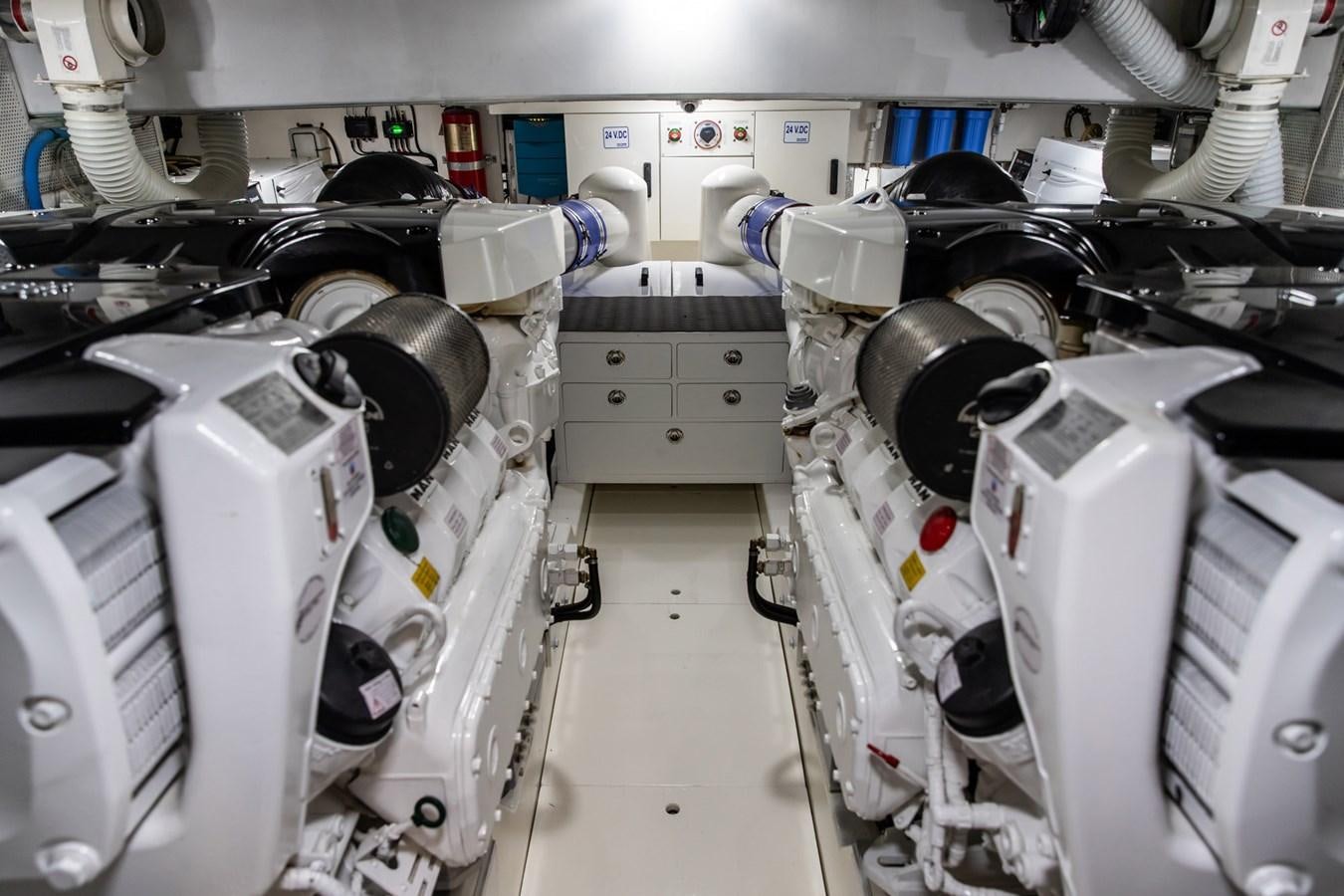 a room with several white machines aboard ARAGOSTA Yacht for Sale