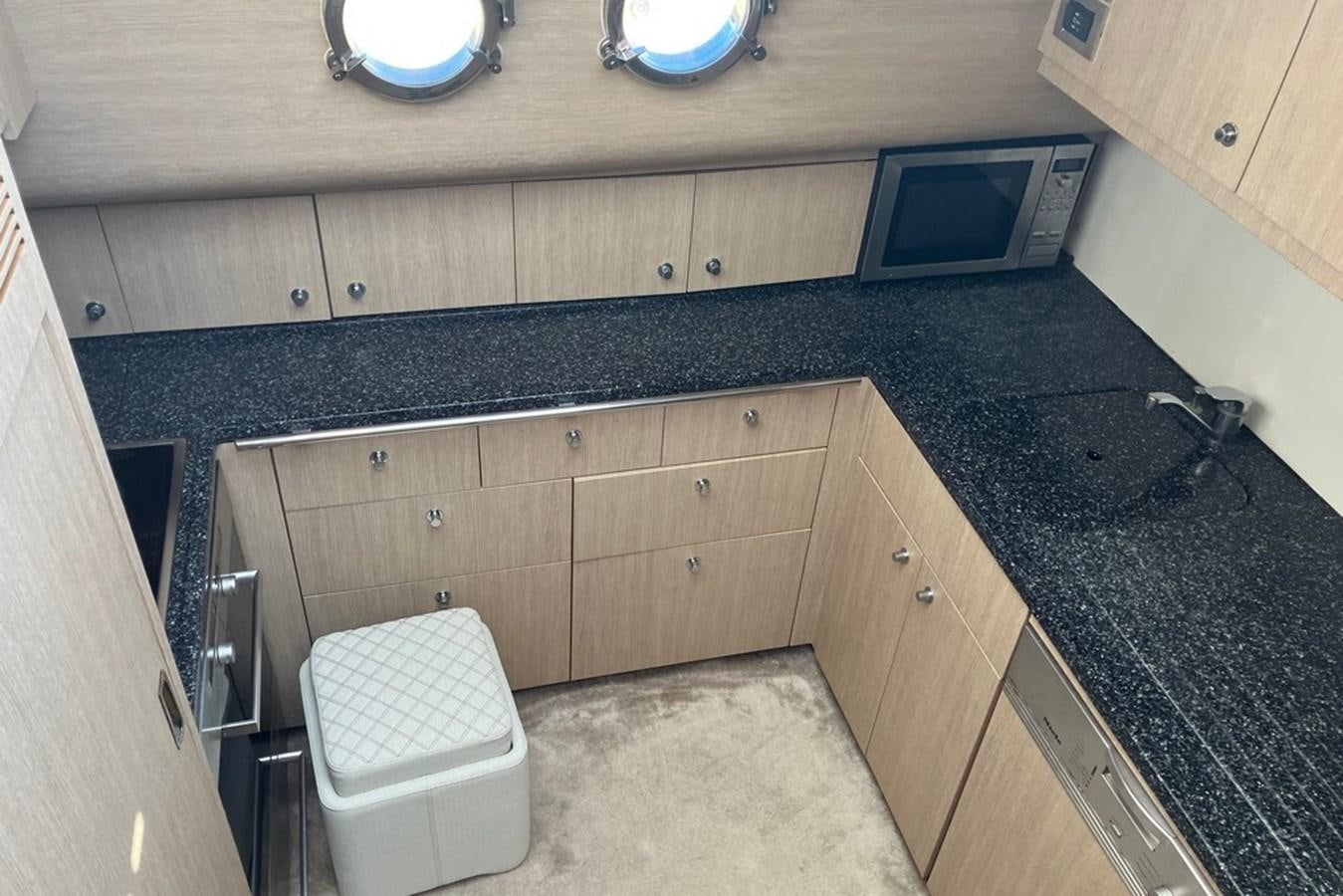 a kitchen with a countertop aboard VINTAGE Yacht for Sale