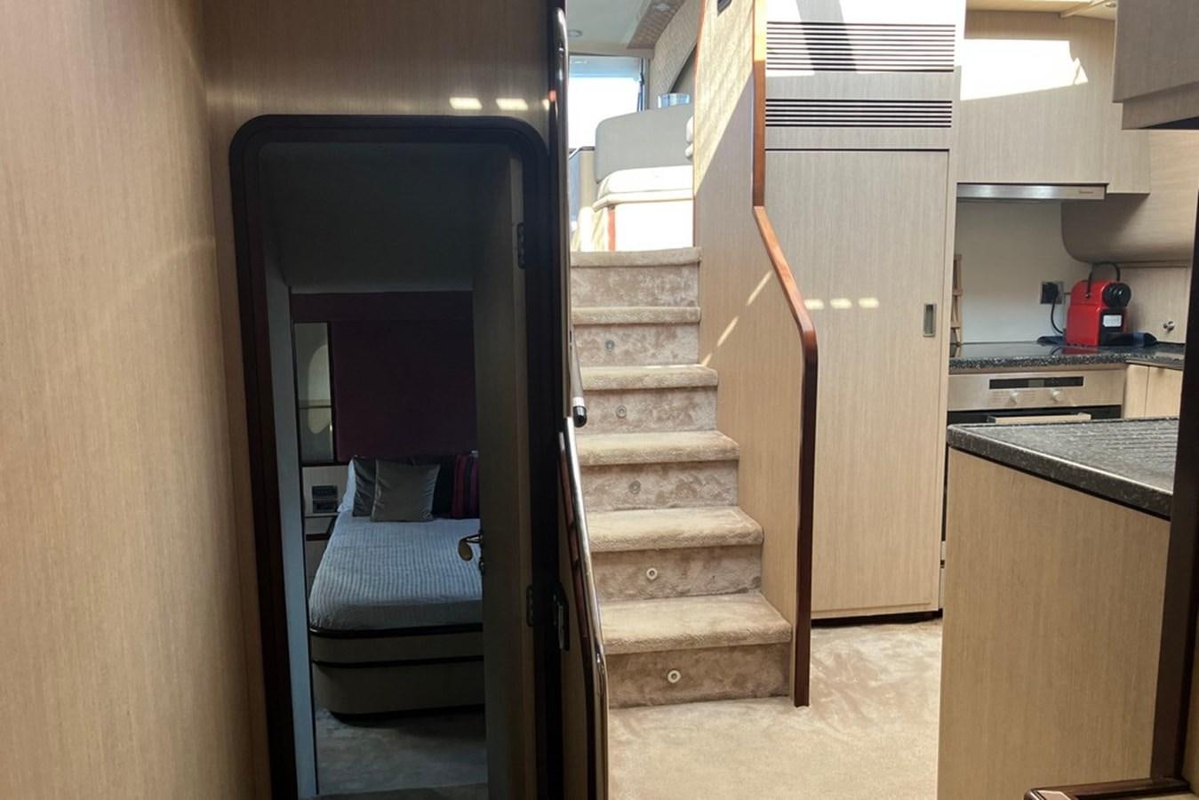 a staircase in a kitchen aboard VINTAGE Yacht for Sale