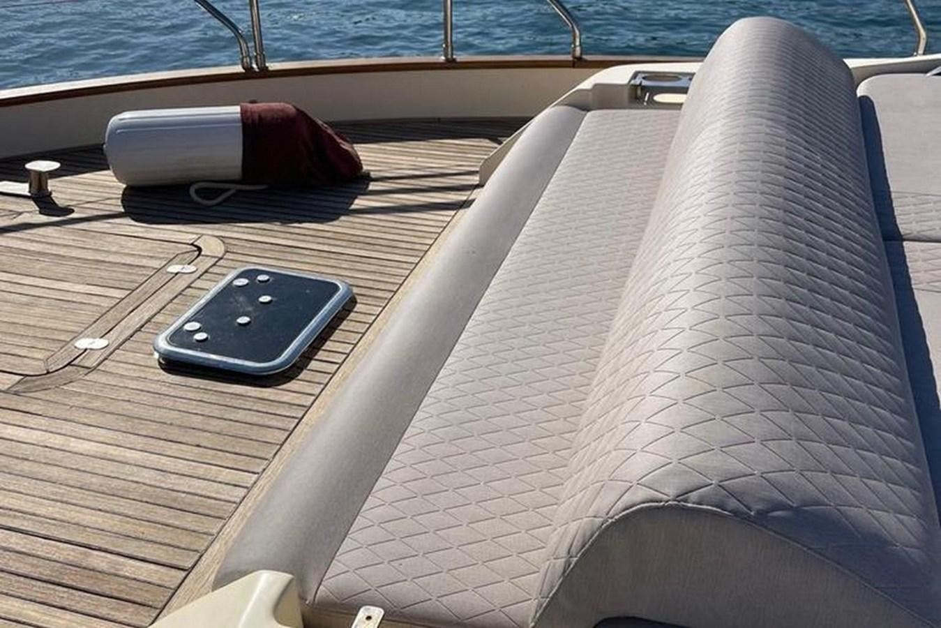 a cell phone on a table aboard VINTAGE Yacht for Sale