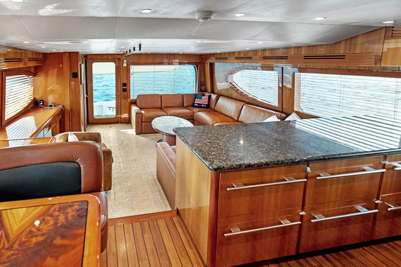 a large kitchen with a large island aboard NAUTICAL NOMAD Yacht for Sale