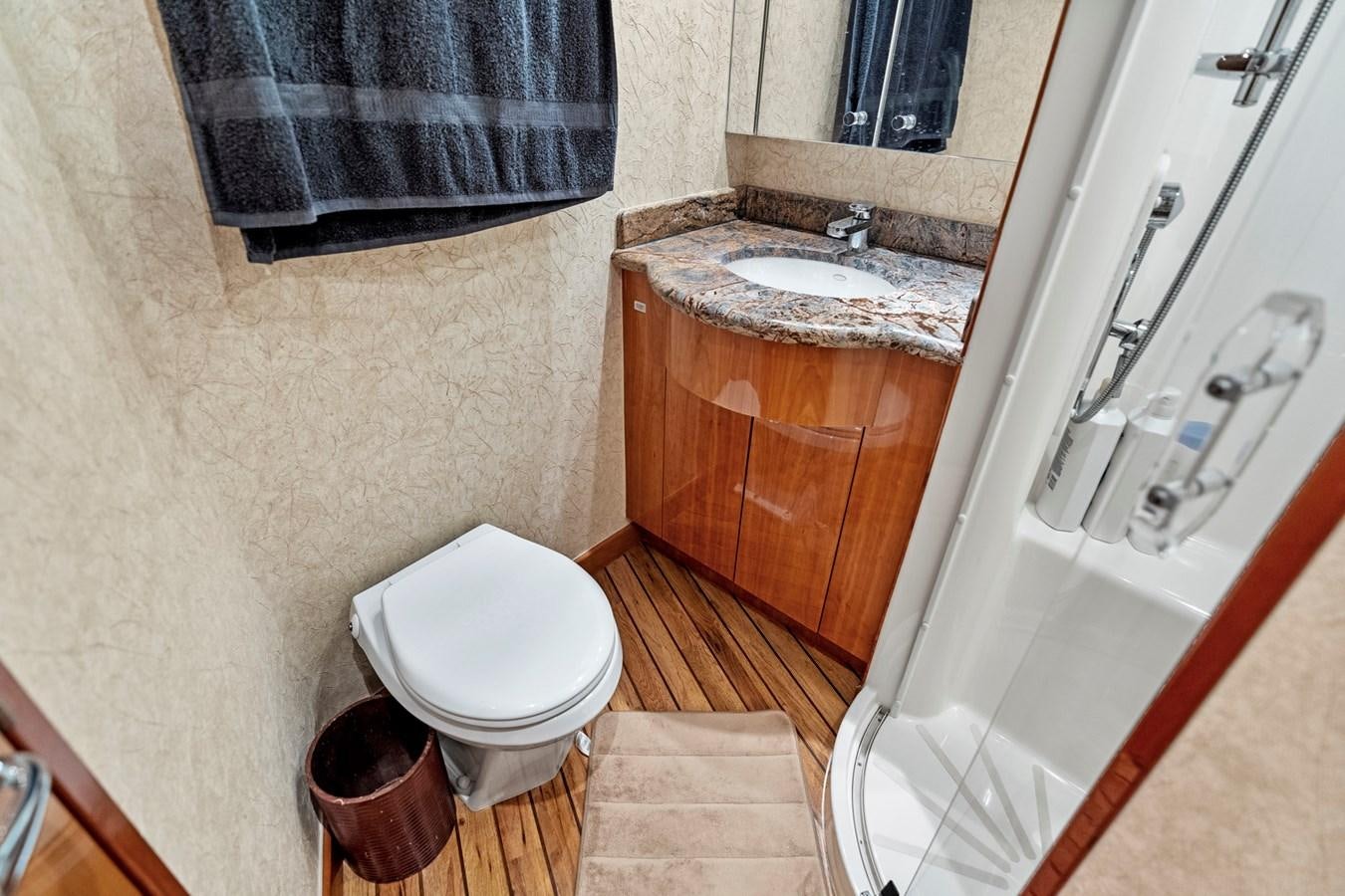 a bathroom with a sink and a toilet aboard NAUTICAL NOMAD Yacht for Sale