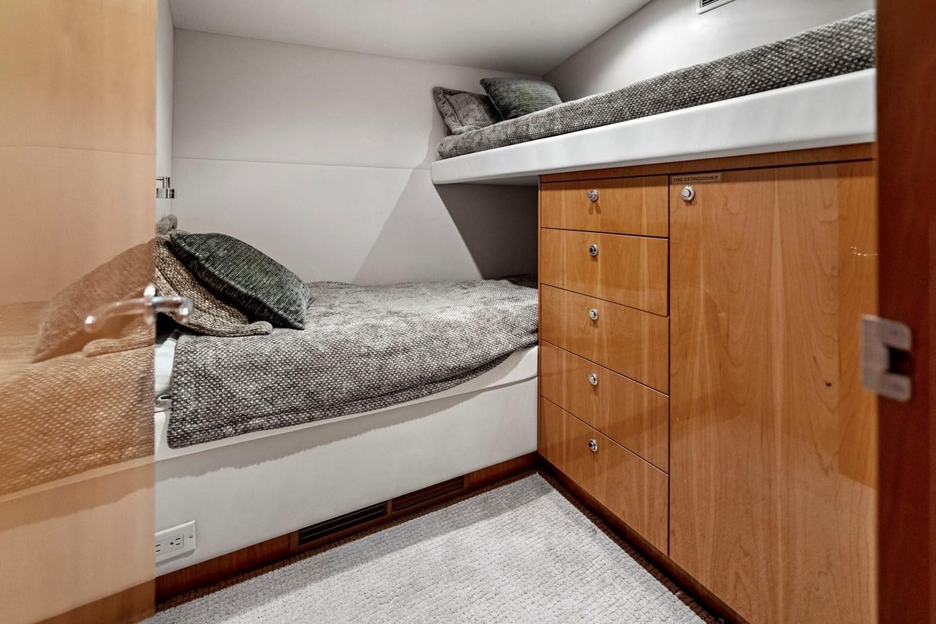 a bed with a pillow on it aboard NAUTICAL NOMAD Yacht for Sale