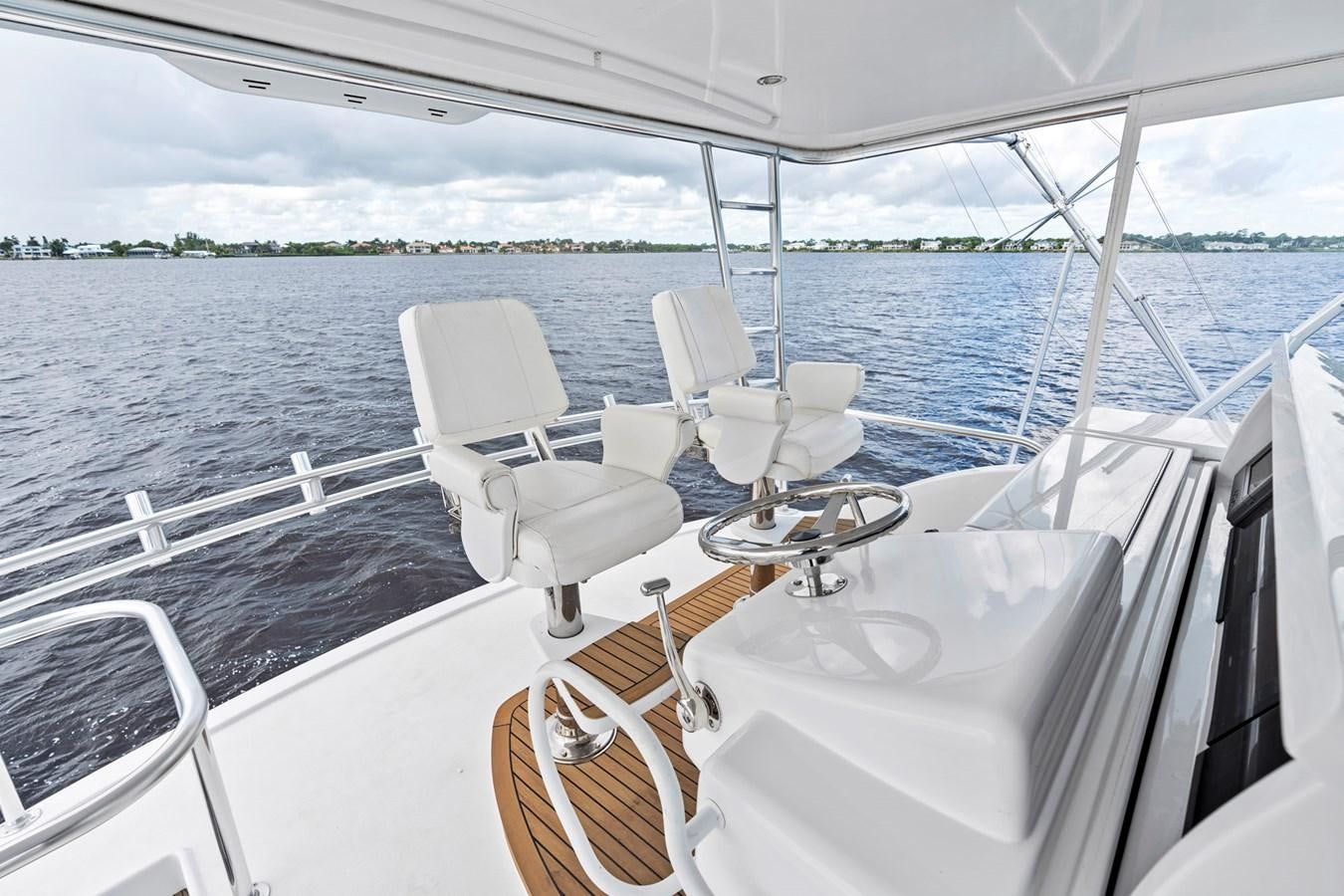 a boat with chairs on it aboard NAUTICAL NOMAD Yacht for Sale
