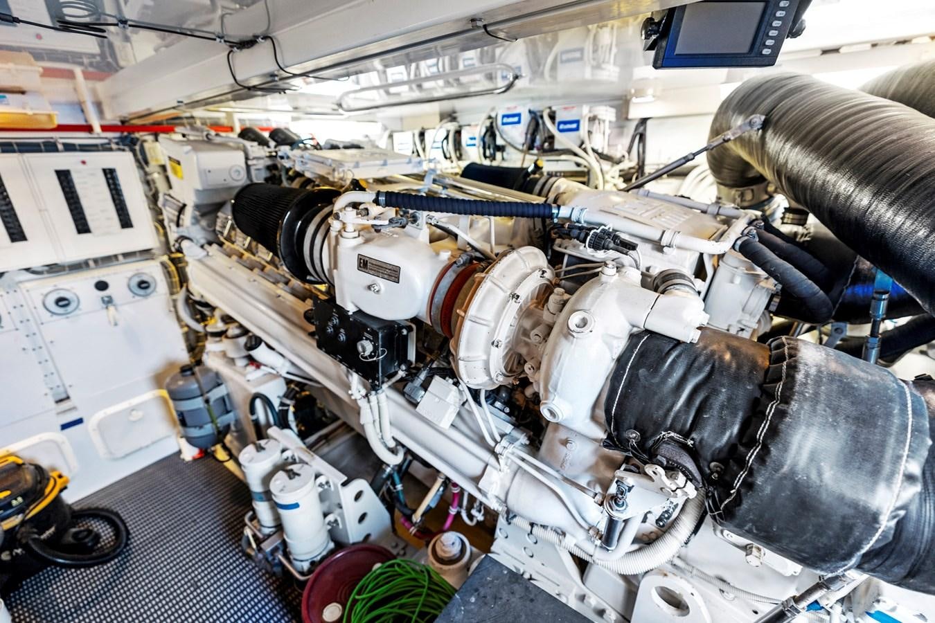 a car engine with a large metal cylinder aboard NAUTICAL NOMAD Yacht for Sale