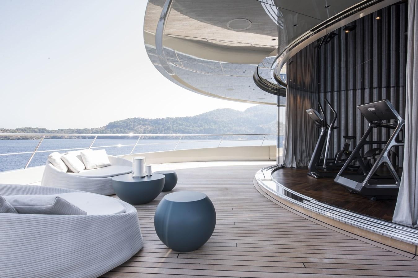 a room with a large window and a view of the ocean aboard SAVANNAH Yacht for Sale