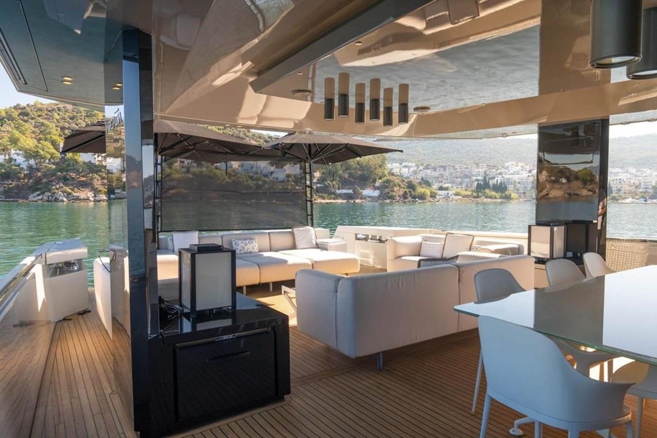 a room with a large window overlooking a city aboard ARCADIA 85 2015 Yacht for Sale