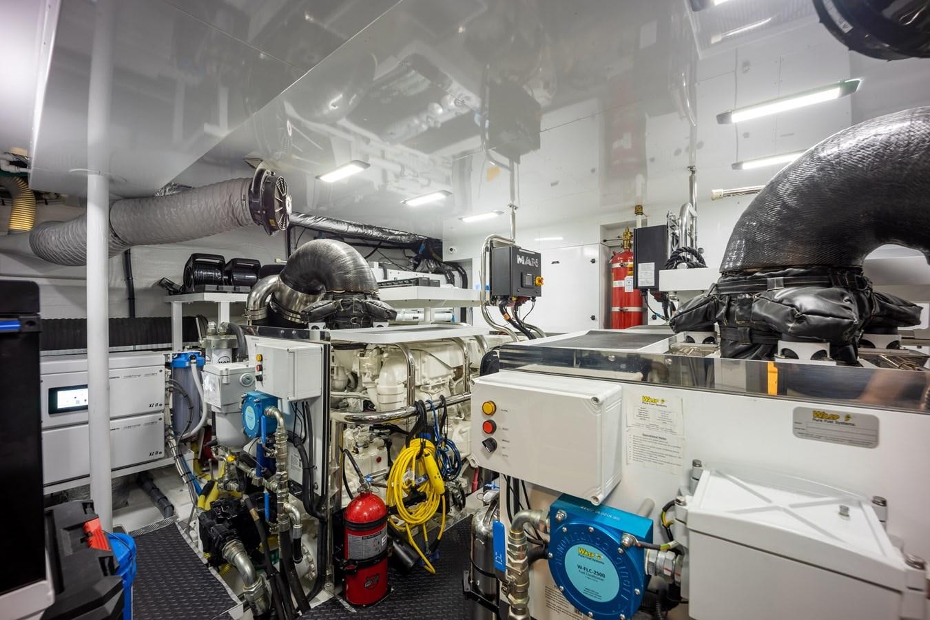 a large room with machinery aboard ESCAPEMENT Yacht for Sale