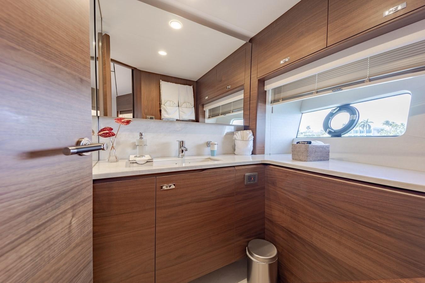 a kitchen with a microwave oven aboard ESCAPEMENT Yacht for Sale
