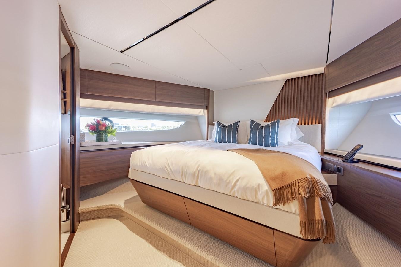 a room with two beds aboard ESCAPEMENT Yacht for Sale