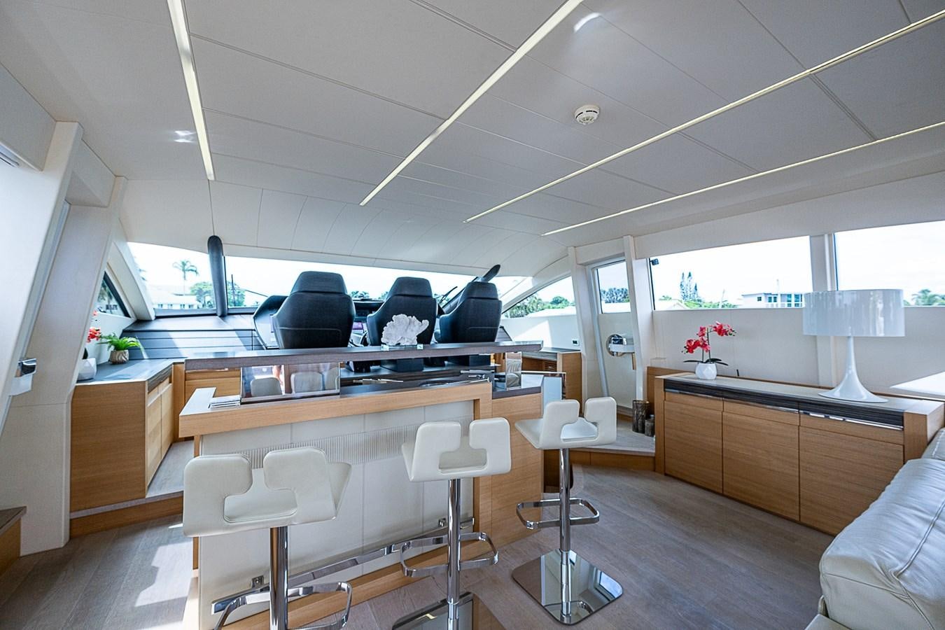 a room with a desk and chairs aboard COAL BLOODED Yacht for Sale