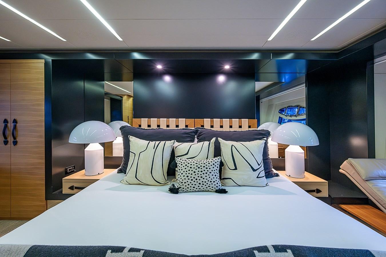 a bed with pillows and pillows aboard COAL BLOODED Yacht for Sale