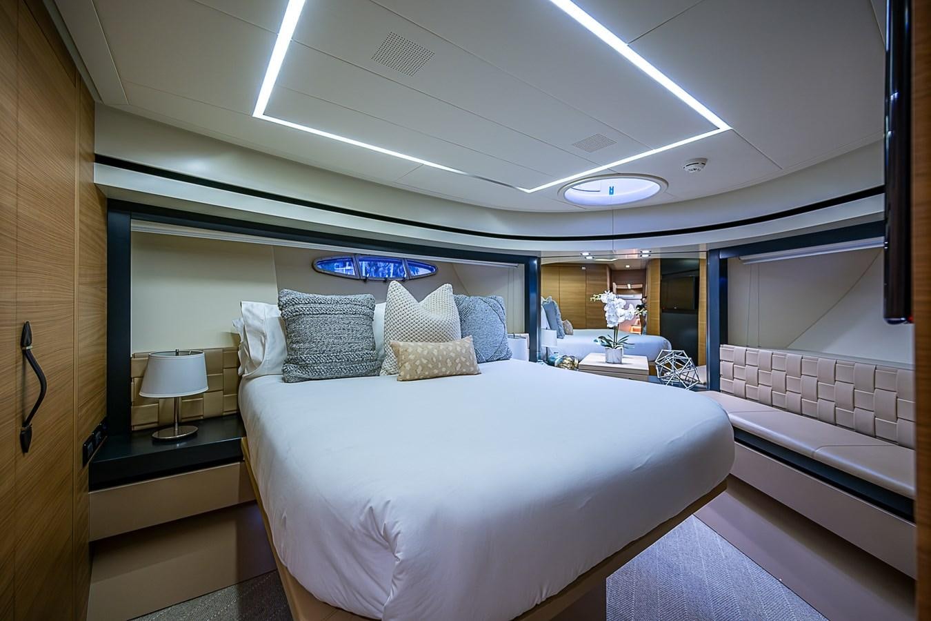 a room with a bed and a table aboard COAL BLOODED Yacht for Sale