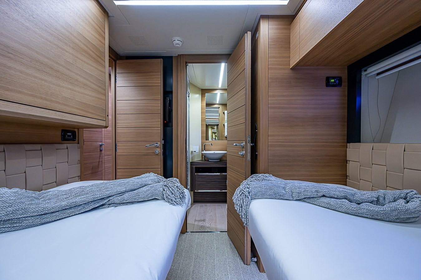 a room with two beds aboard COAL BLOODED Yacht for Sale