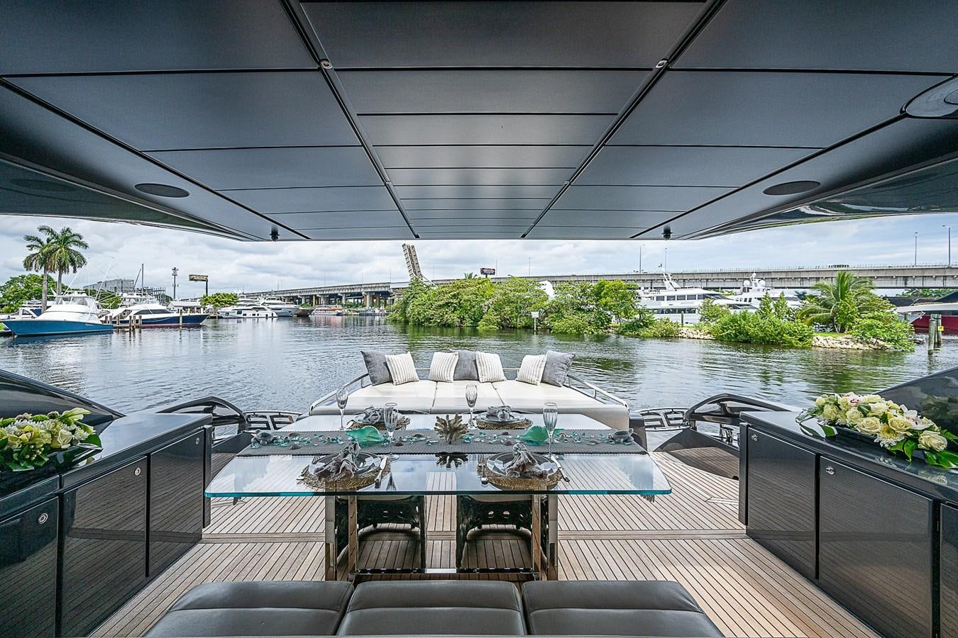 a room with a table and chairs aboard COAL BLOODED Yacht for Sale
