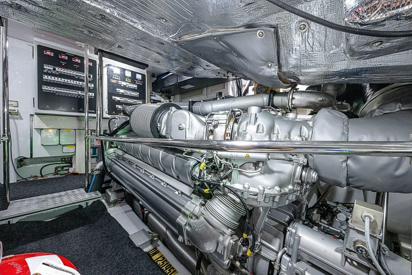 a car with a large engine aboard COAL BLOODED Yacht for Sale