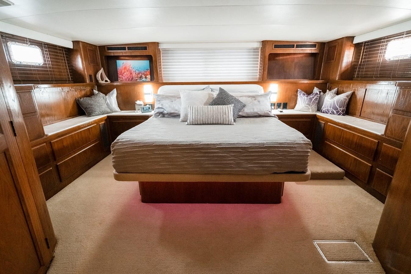 a bed in a cabin aboard HIGH IMPACT Yacht for Sale