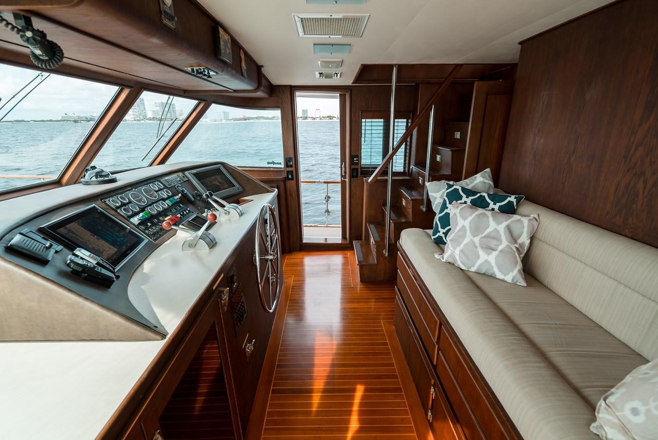 a bedroom with a bed and a desk aboard HIGH IMPACT Yacht for Sale