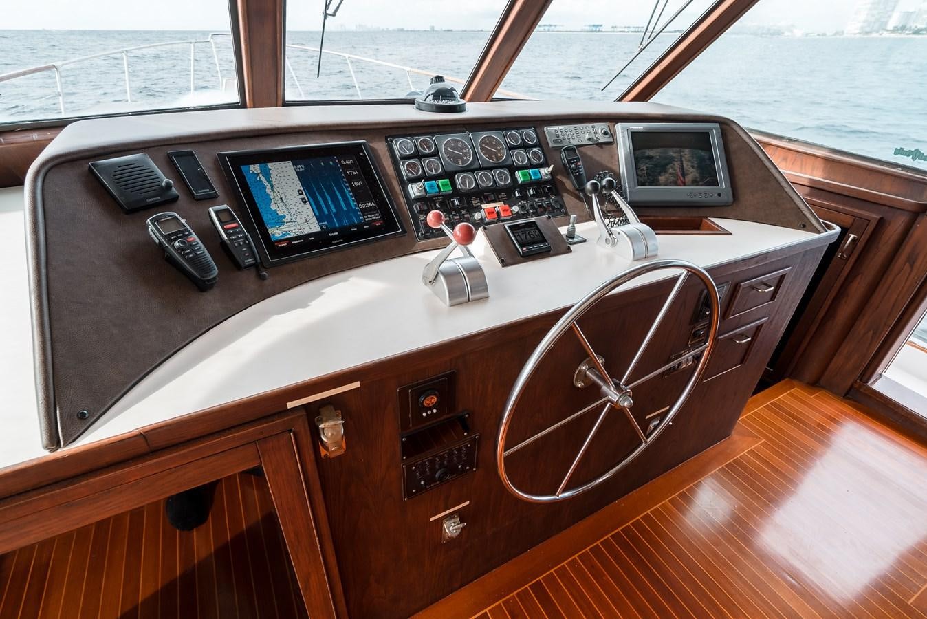 a control panel on a car aboard HIGH IMPACT Yacht for Sale
