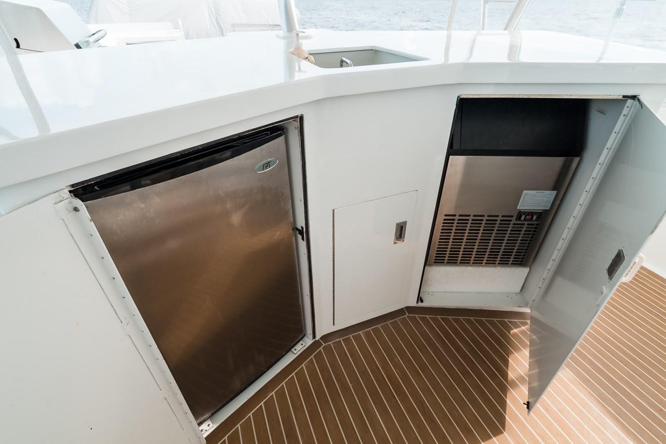 a room with a sink and a door aboard HIGH IMPACT Yacht for Sale