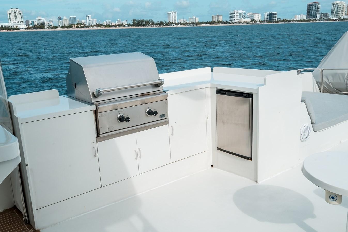a white boat on a white surface aboard HIGH IMPACT Yacht for Sale