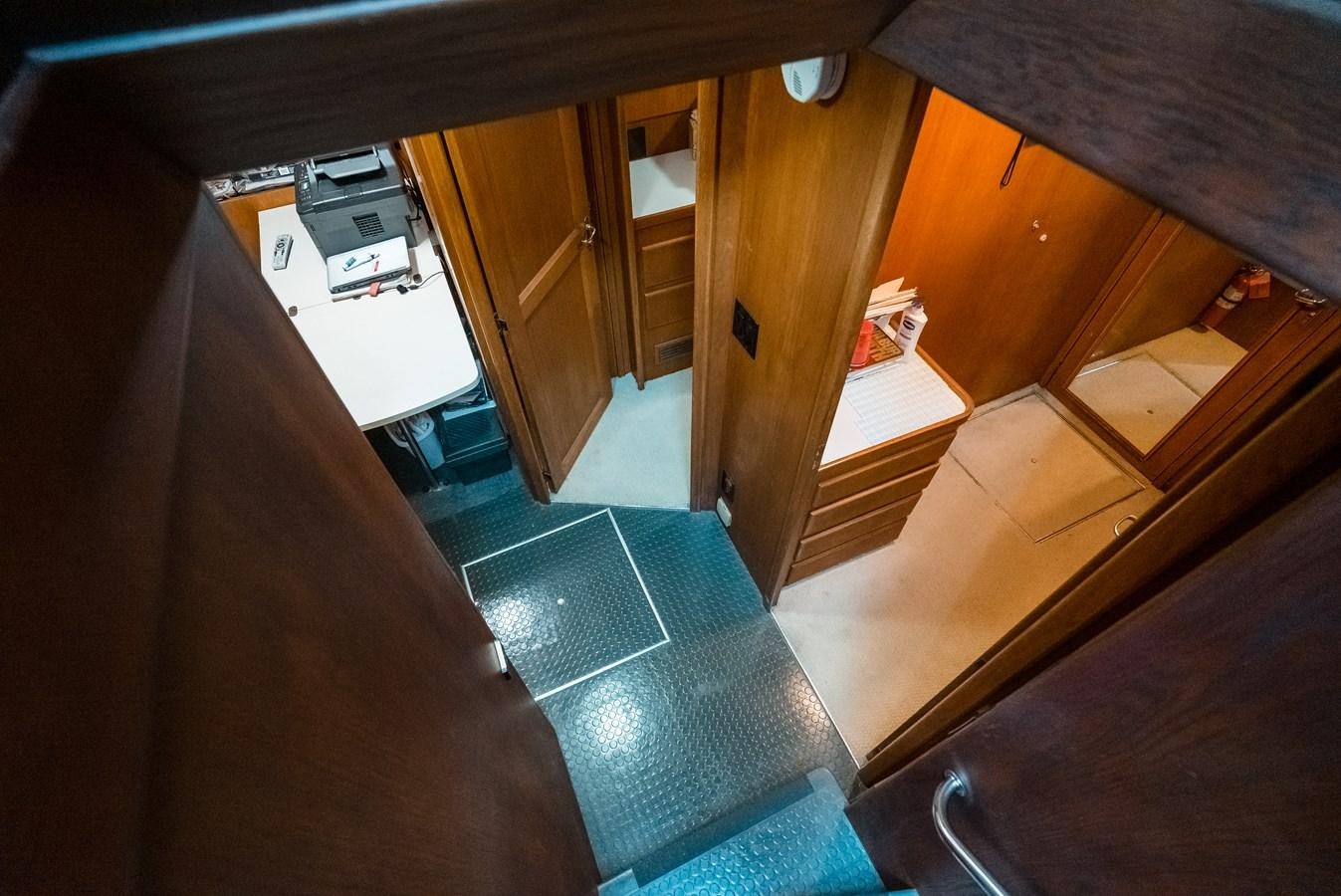 a view of a room from the stairs aboard HIGH IMPACT Yacht for Sale