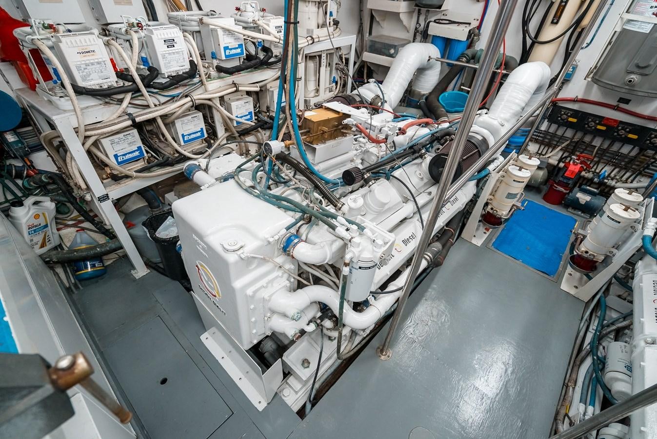 a machine with a large piece of equipment on it aboard HIGH IMPACT Yacht for Sale