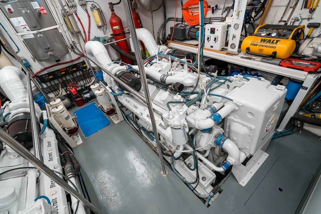 a machine with a large white object aboard HIGH IMPACT Yacht for Sale