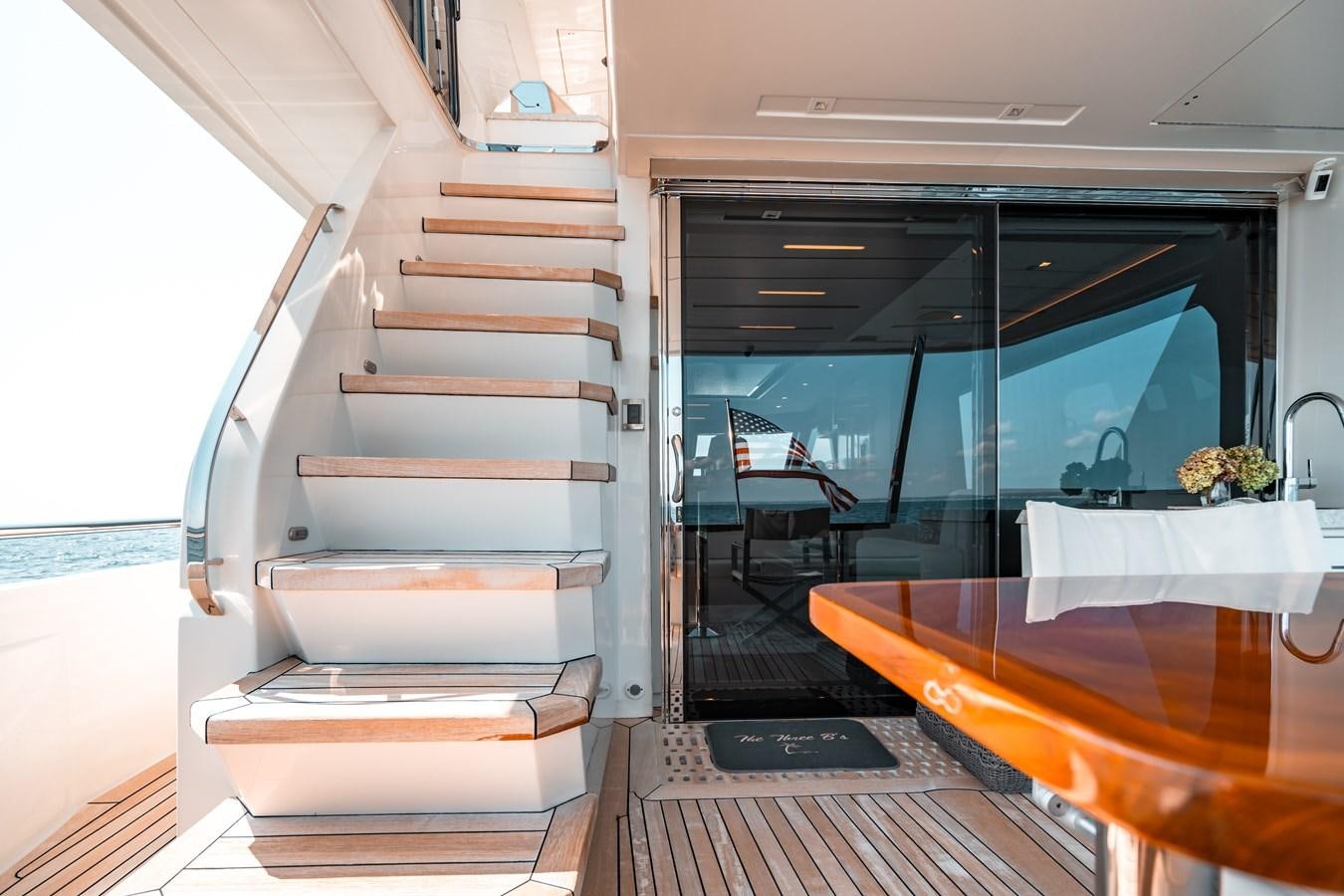a staircase leading to a room aboard THE THREE B'S Yacht for Sale