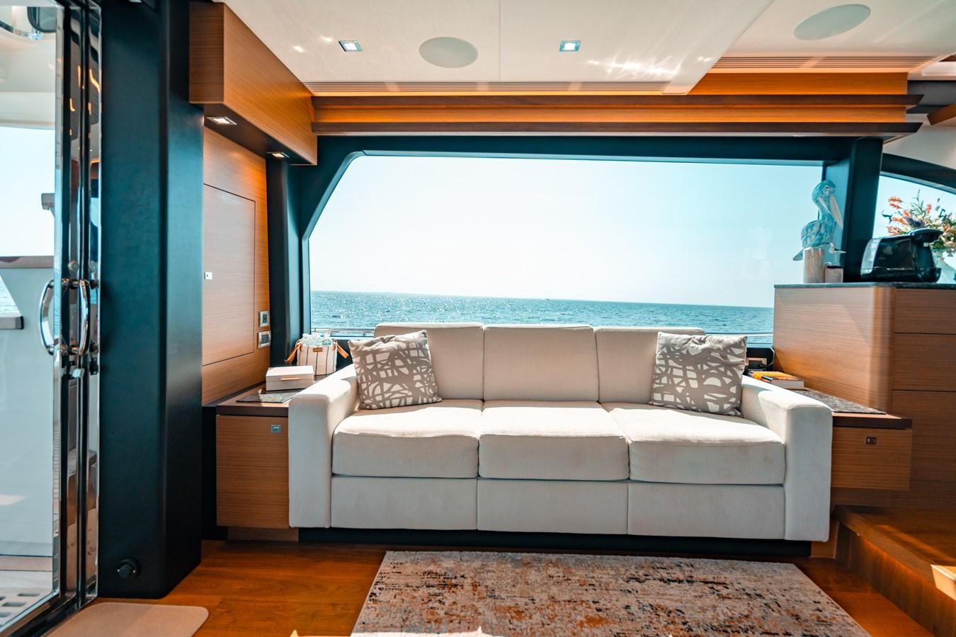 a living room with a couch aboard THE THREE B'S Yacht for Sale