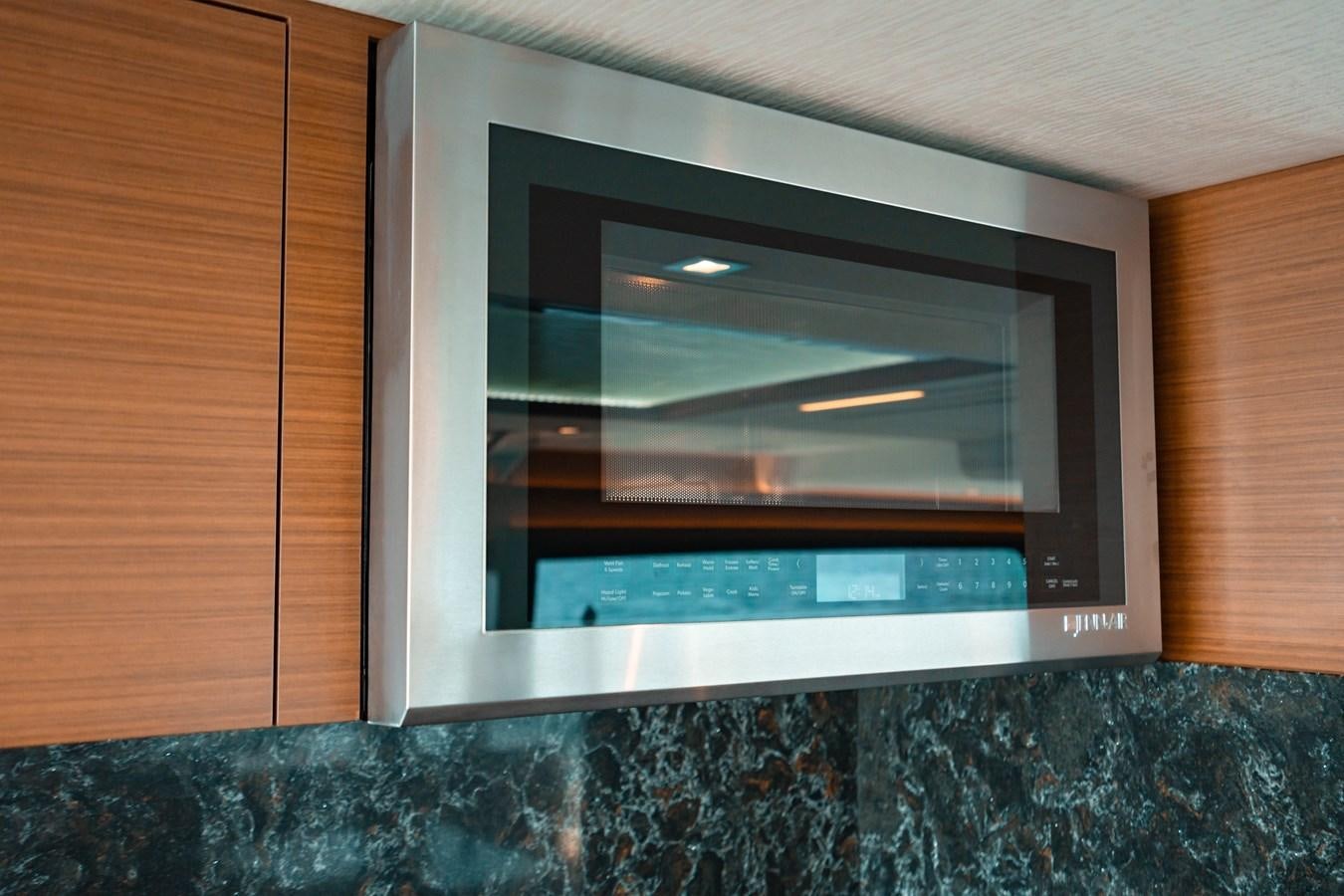 a rectangular electronic device aboard THE THREE B'S Yacht for Sale