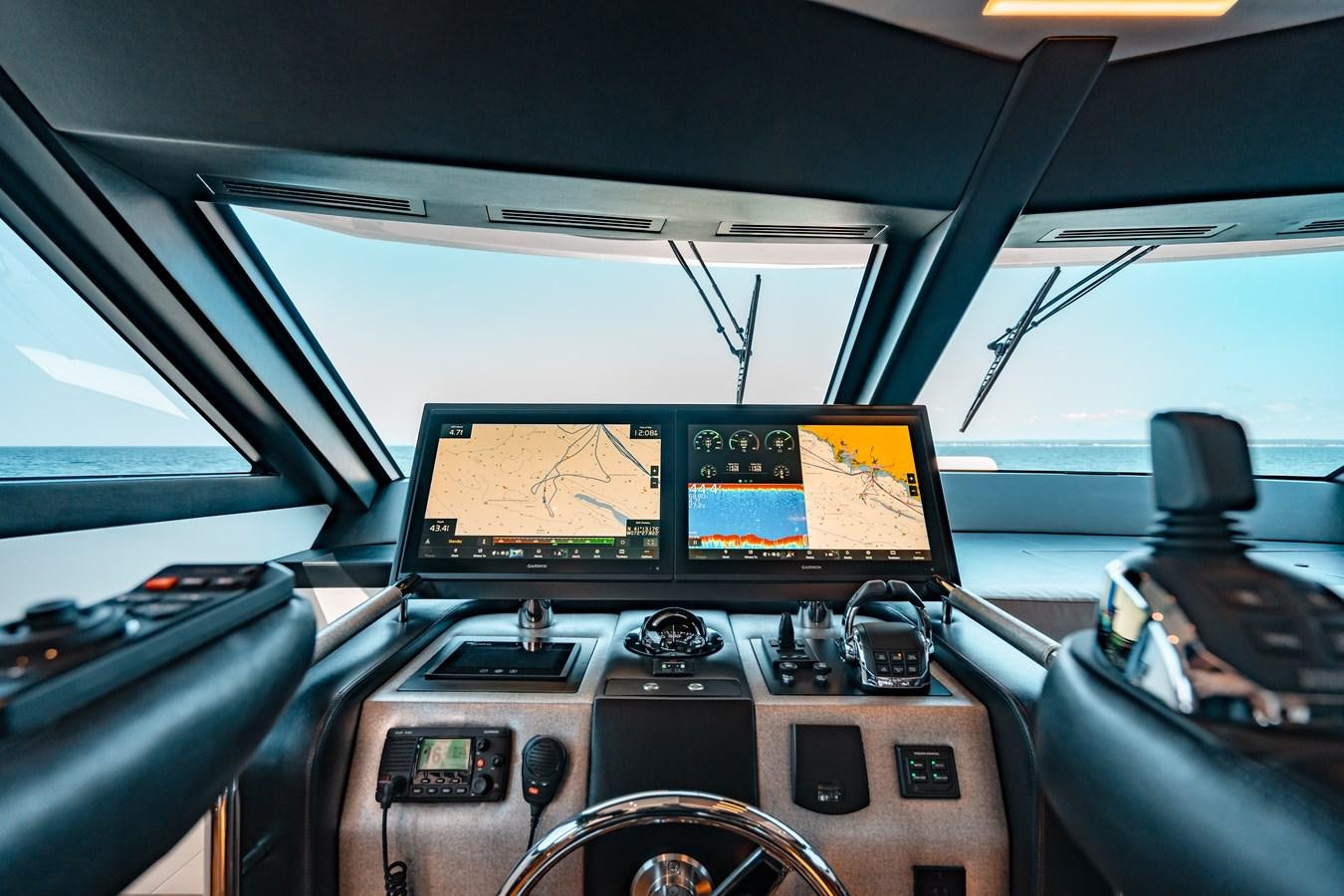 inside of a car aboard THE THREE B'S Yacht for Sale