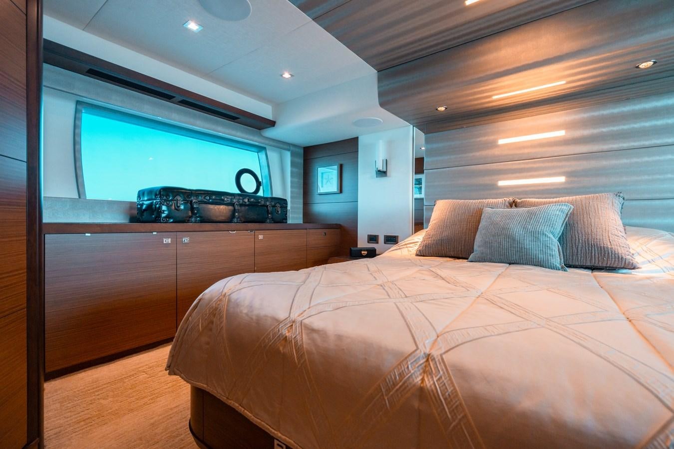 a bed in a room aboard THE THREE B'S Yacht for Sale