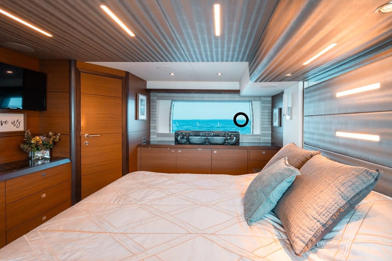 a bed in a room aboard THE THREE B'S Yacht for Sale
