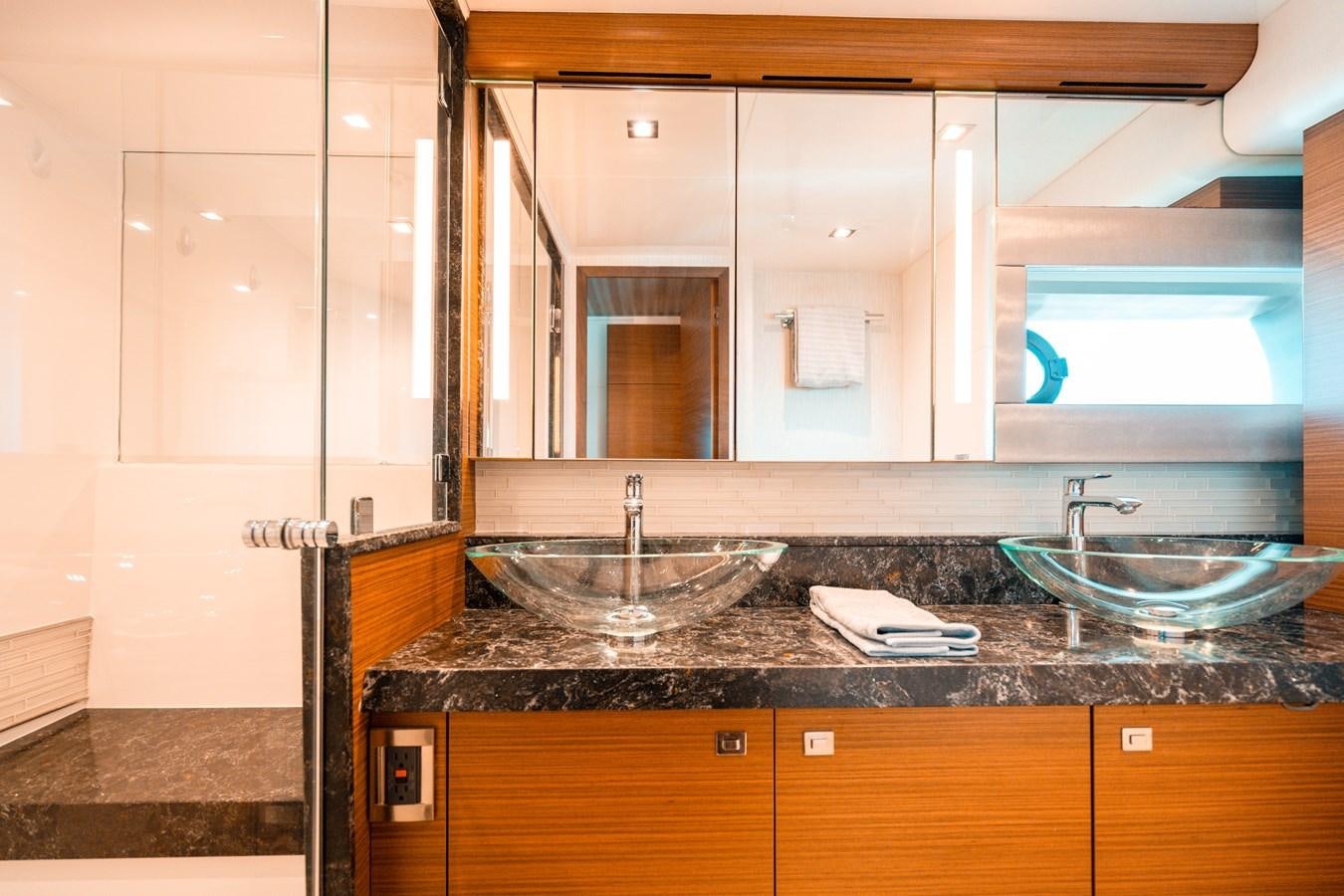a bathroom with a marble counter top aboard THE THREE B'S Yacht for Sale