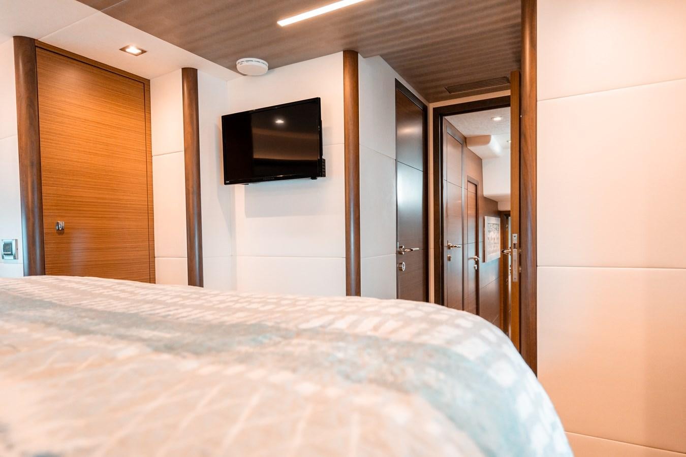 a bed in a room aboard THE THREE B'S Yacht for Sale