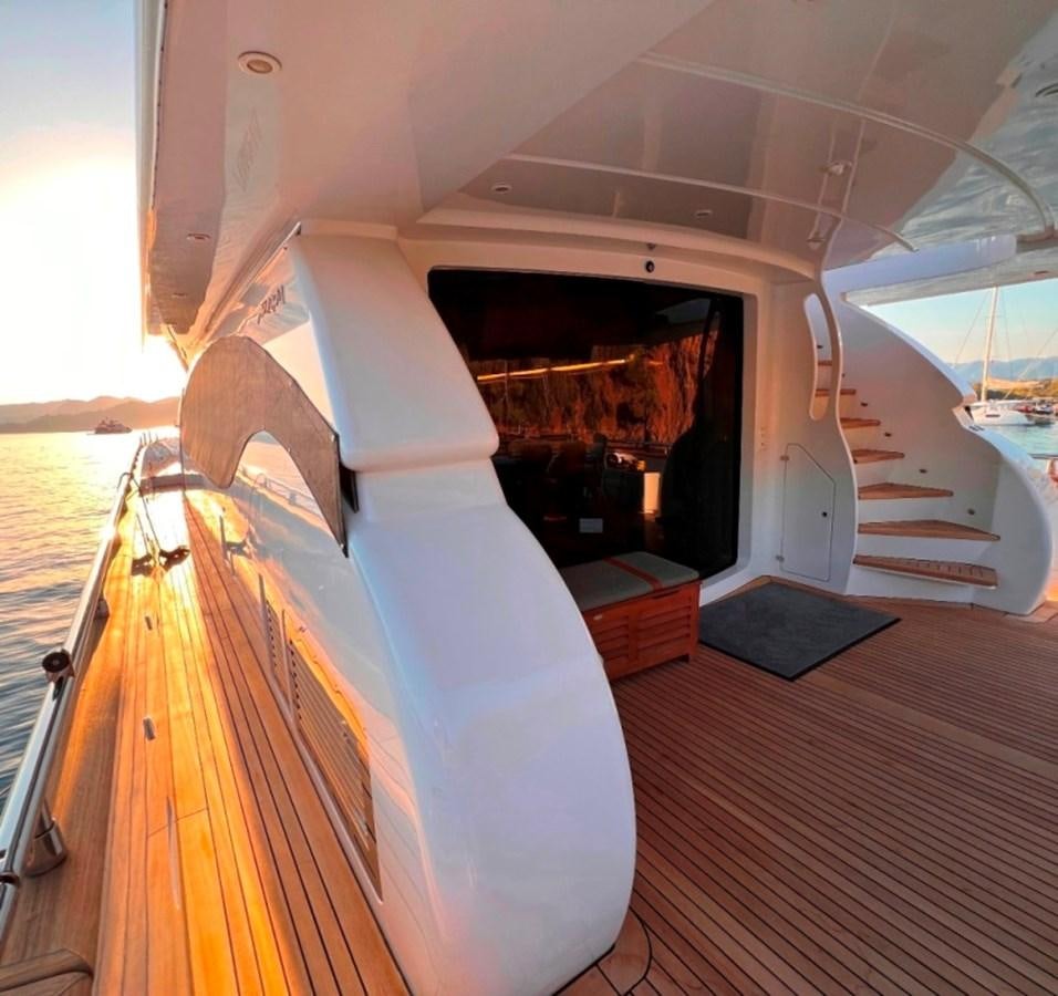 a room with a fireplace aboard MAIORA 26 Yacht for Sale