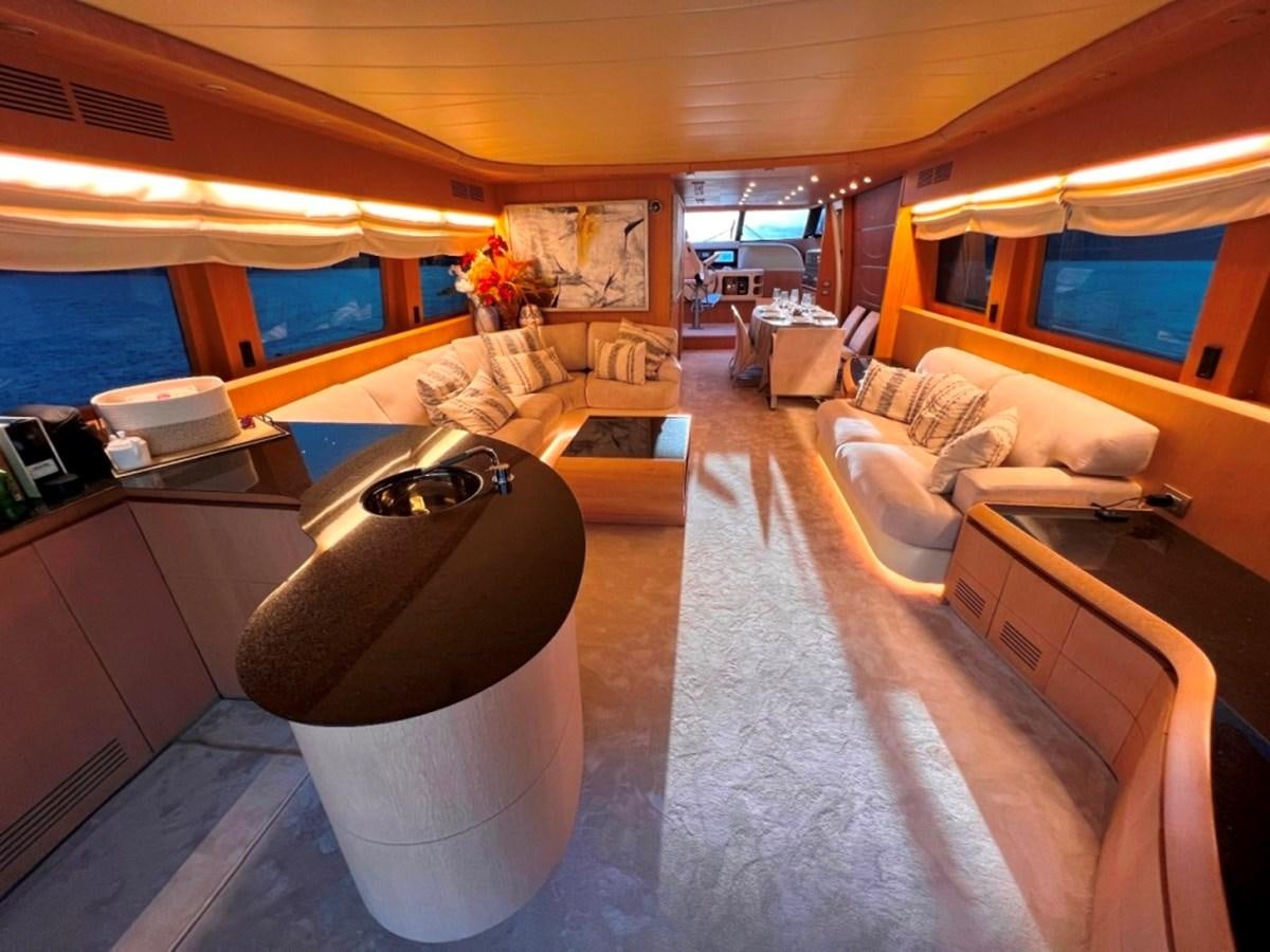 a room with a large bed and a couch aboard MAIORA 26 Yacht for Sale