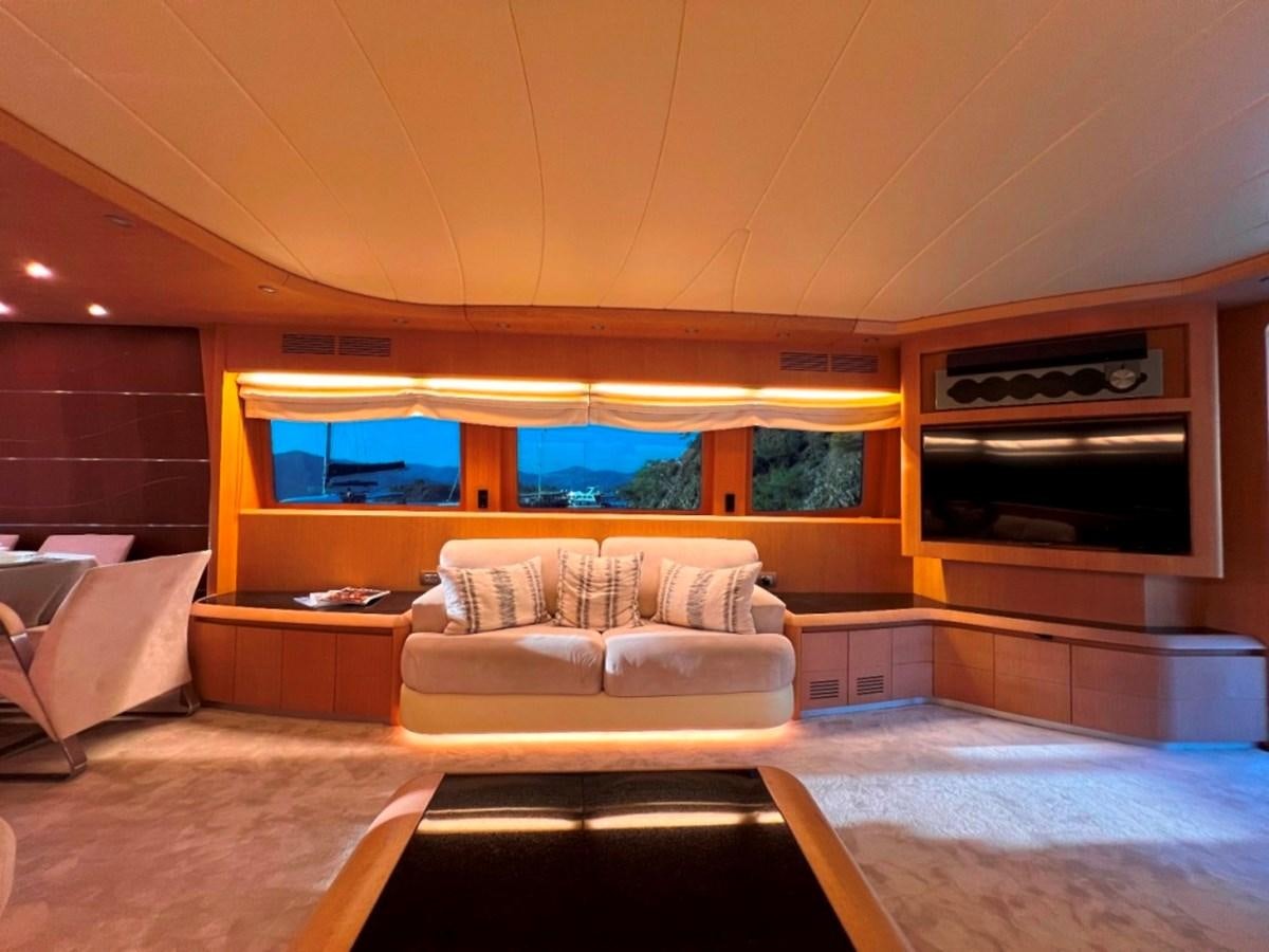 a room with a bed and a television aboard MAIORA 26 Yacht for Sale