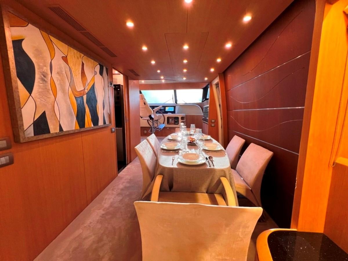 a dining table in a restaurant aboard MAIORA 26 Yacht for Sale