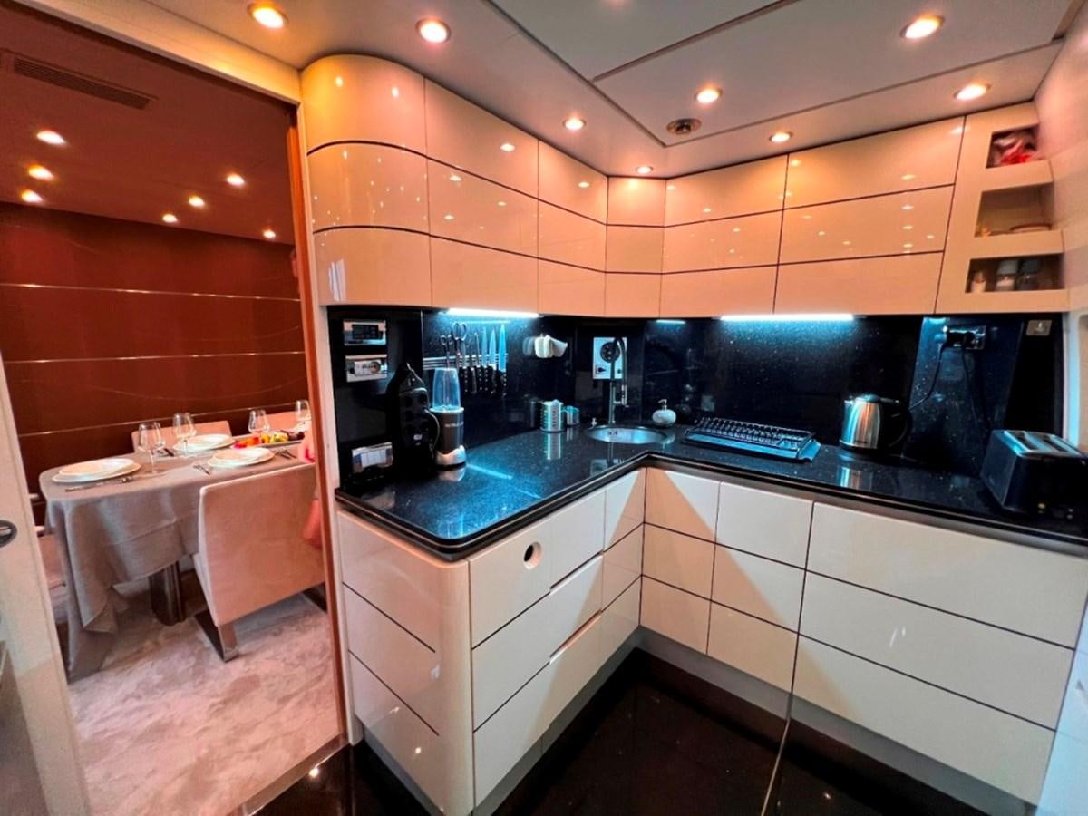 a kitchen with a counter and a sink aboard MAIORA 26 Yacht for Sale