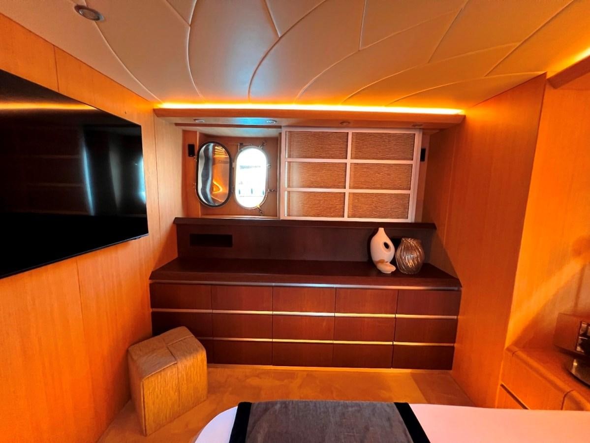 a room with a fireplace aboard MAIORA 26 Yacht for Sale