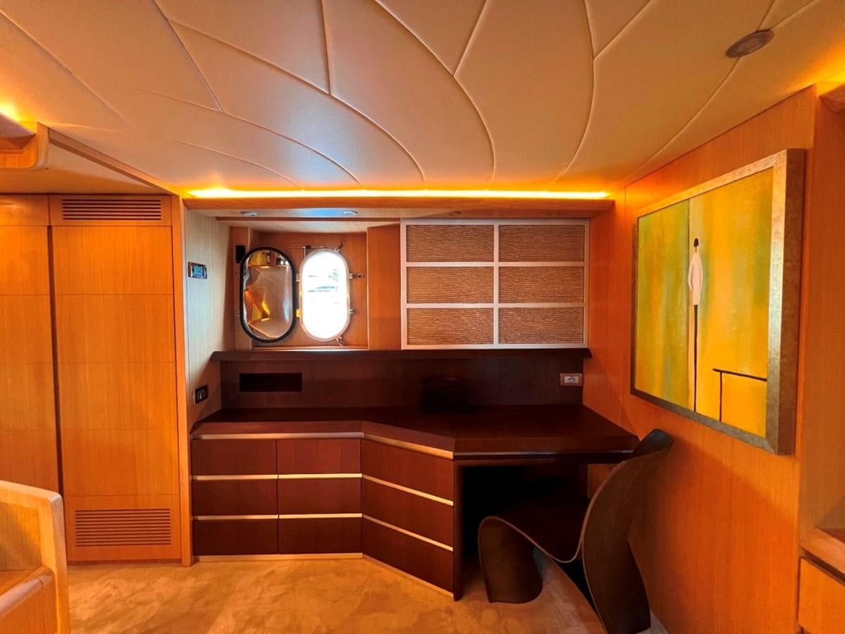 a room with a desk and a mirror aboard MAIORA 26 Yacht for Sale