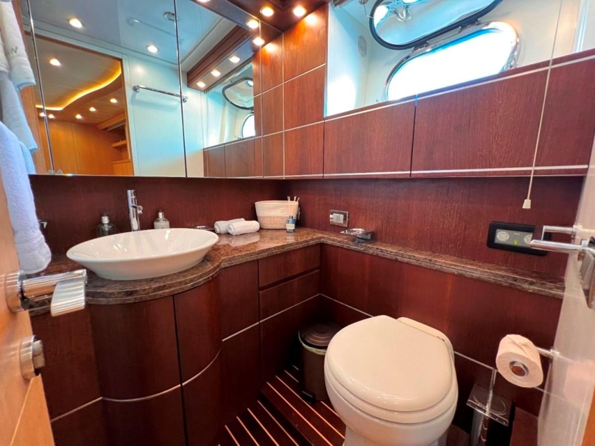 a bathroom with a sink and a toilet aboard MAIORA 26 Yacht for Sale