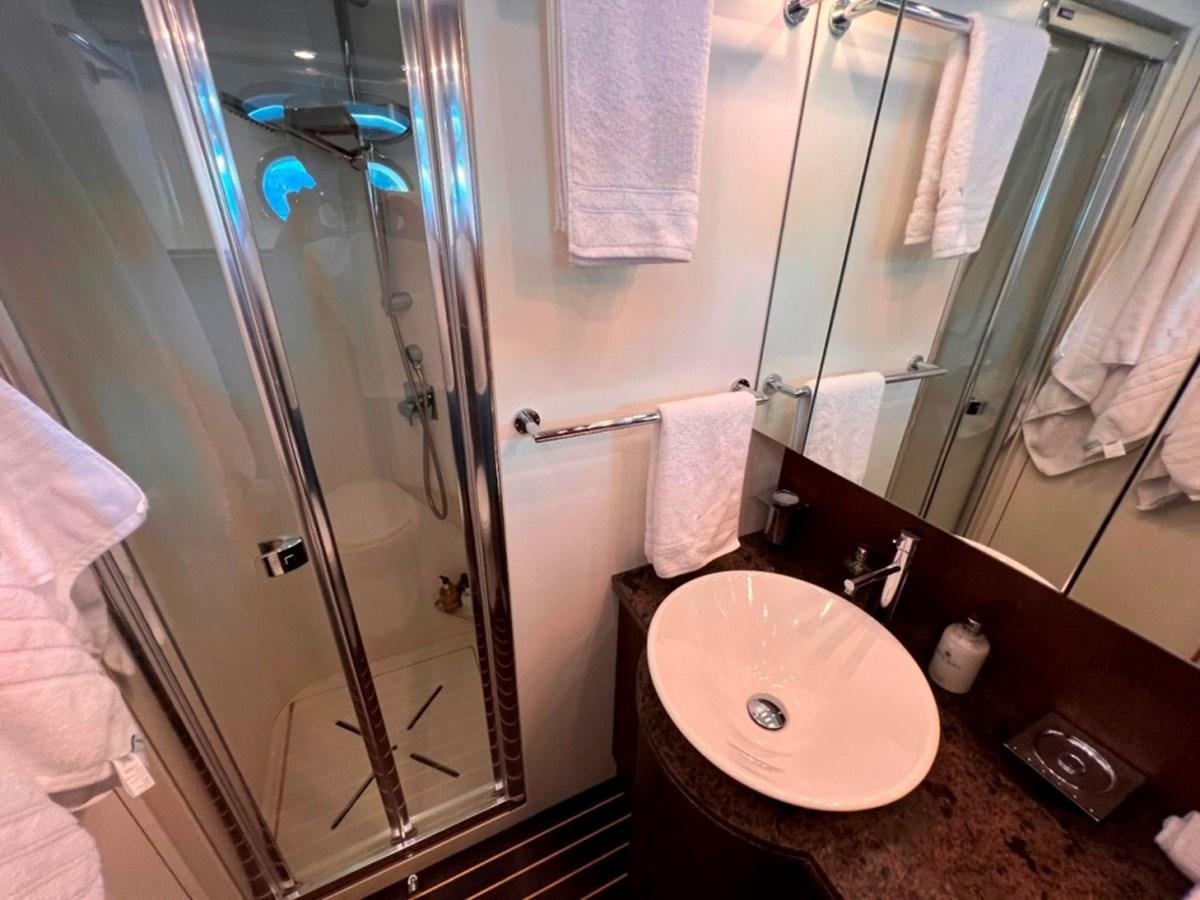 a bathroom with a sink and a shower aboard MAIORA 26 Yacht for Sale