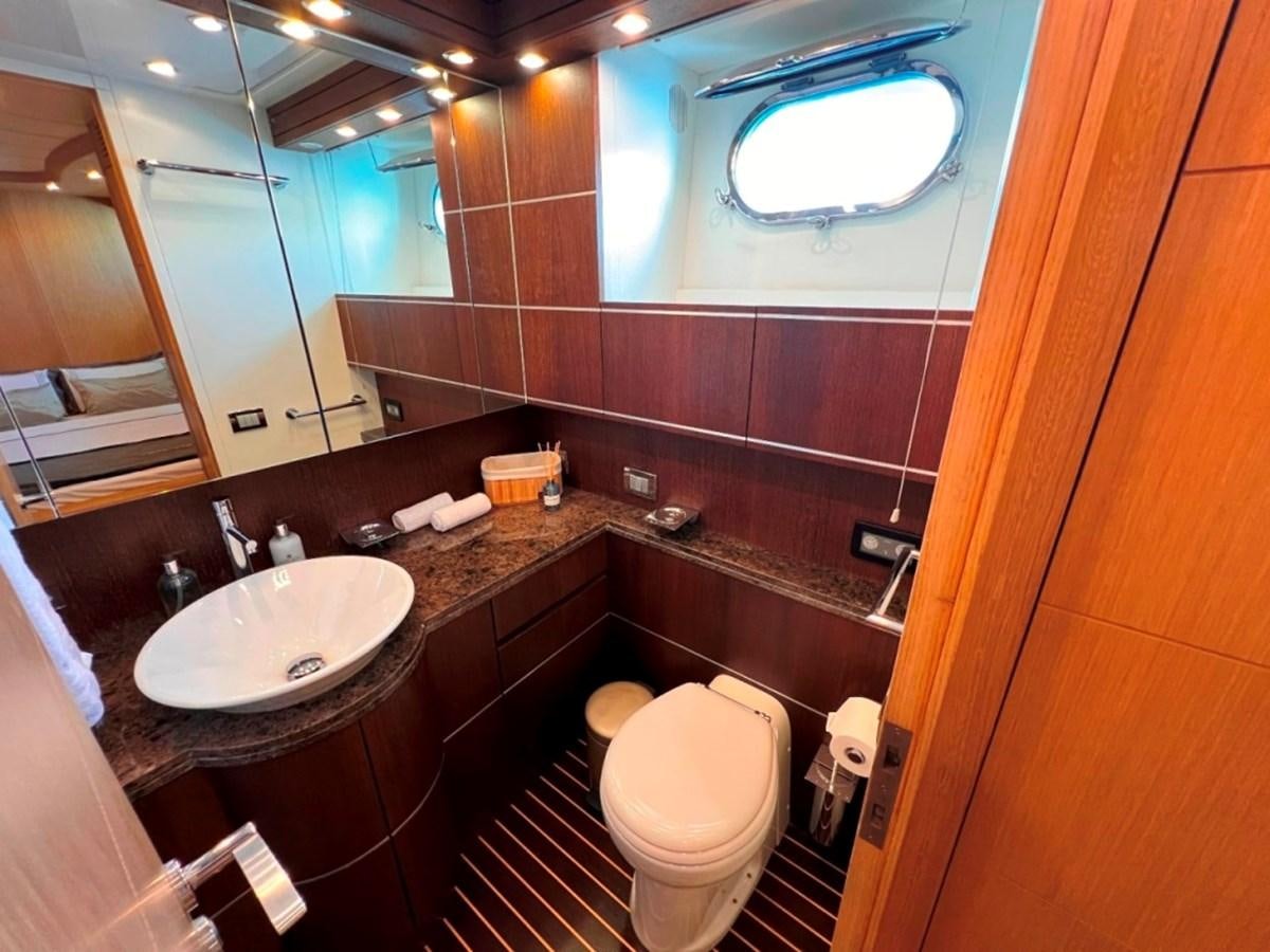 a bathroom with a sink and a toilet aboard MAIORA 26 Yacht for Sale
